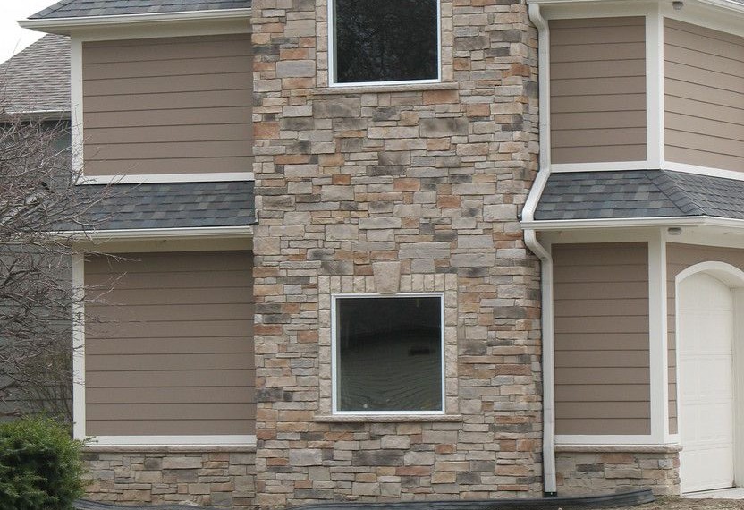 Cultured Stone Veneer Traditional Exterior with Stone and Wood Siding
