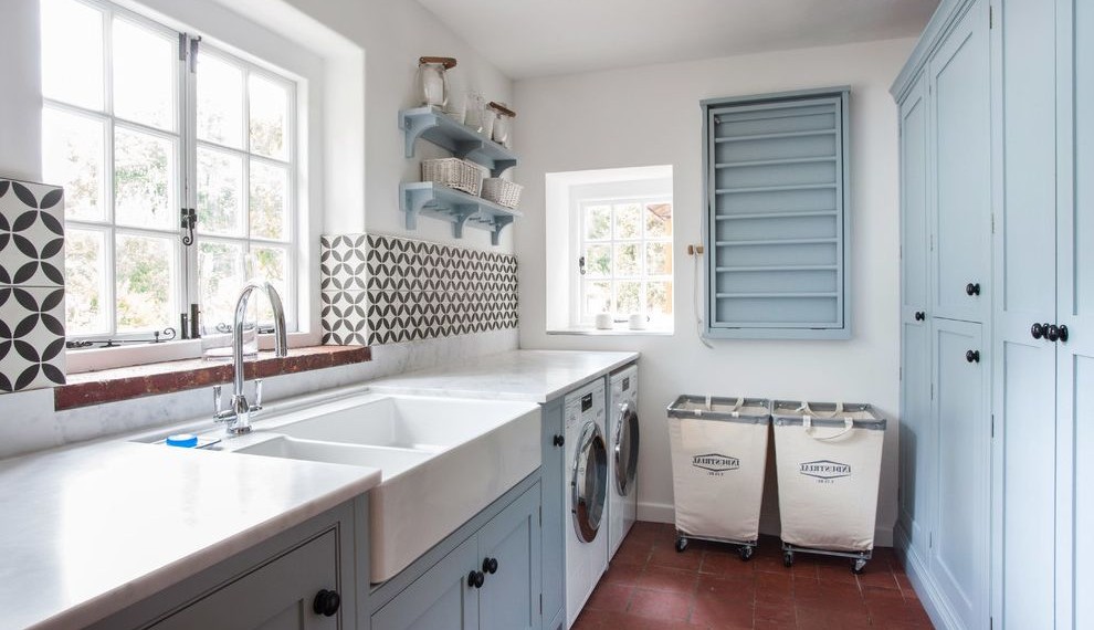 Energy Efficient Washer and Dryer Farmhouse Laundry Room with Farmhouse Sink