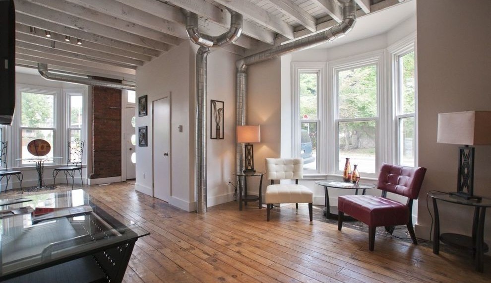 Exposed Air Conditioning Ducts Modern Family Room with Exposed Brick