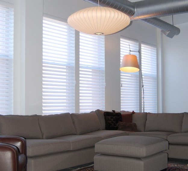 Exposed Air Conditioning Ducts Modern Living Room with Club Chair