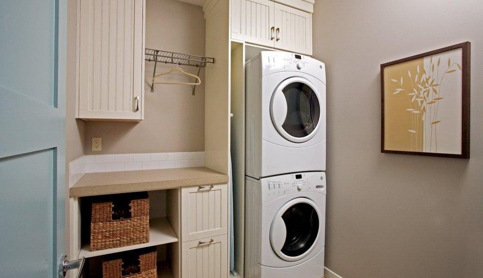 Hamper Washer Dryer Traditional Laundry Room with Beadboard Cabinets