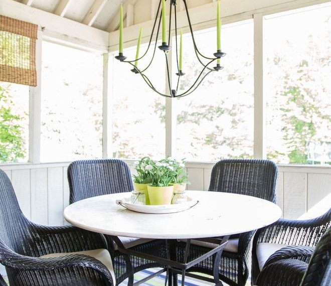 Indoor Wicker Rocking Chair Farmhouse Sunroom with Green Candles