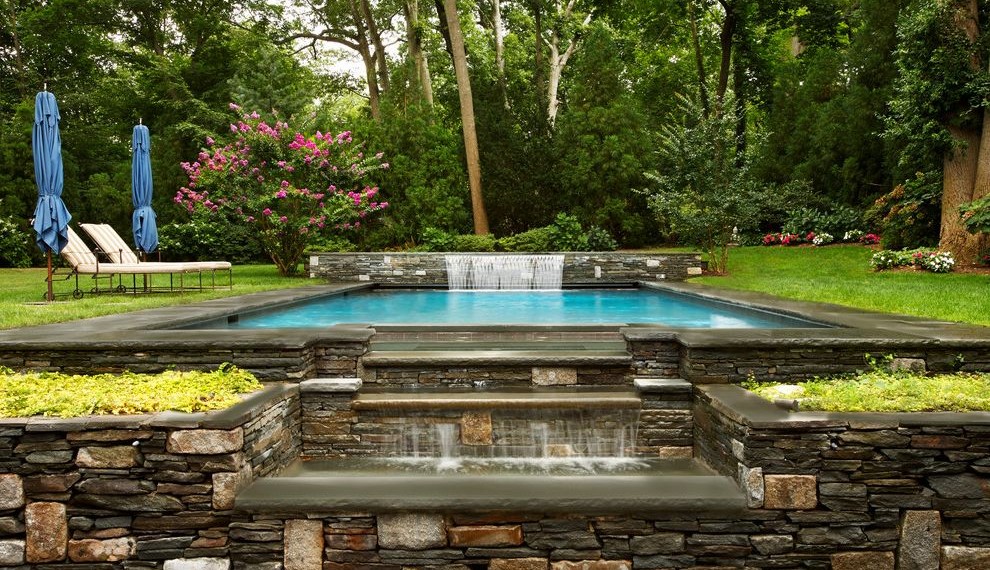 Large Retaining Wall Blocks Traditional Pool with Views