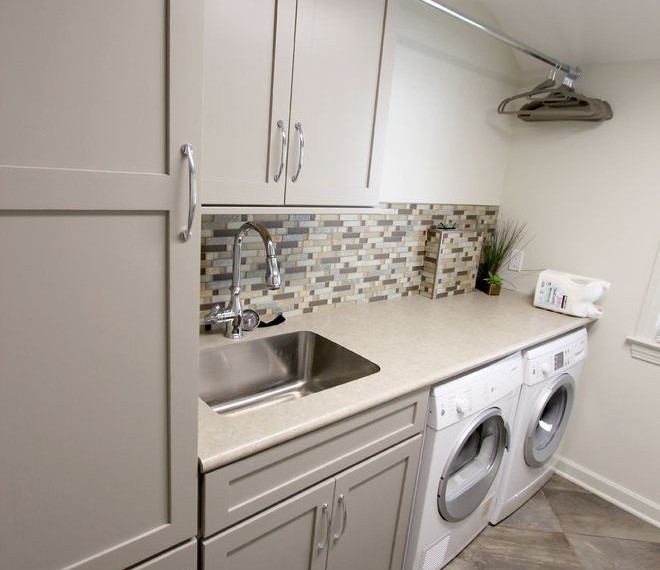 Moen Faucets Transitional Laundry Room with Concrete Stone Countertop