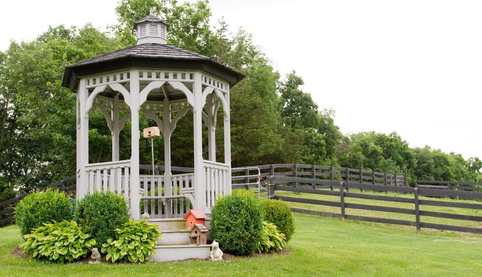 Screened in Gazebo Farmhouse Deck with Shrubs
