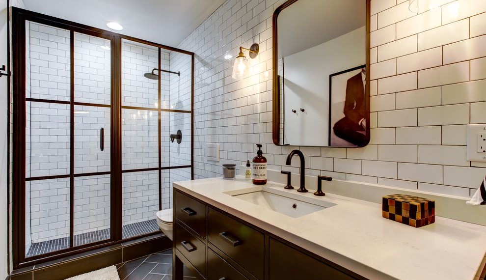 Subway Tile Patterns Industrial Bathroom with Black Flat Panel Vanity