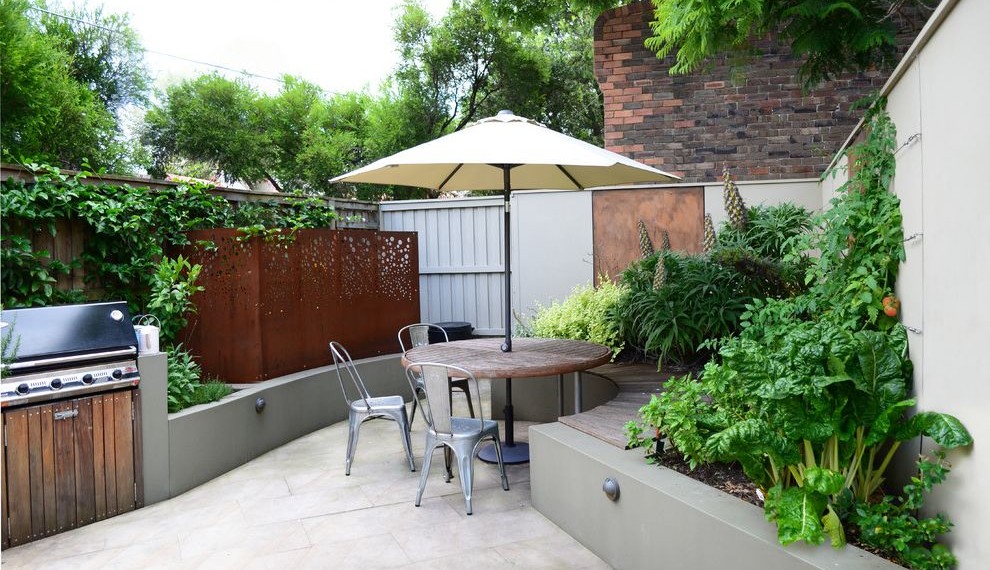 Tilt Trash Can Contemporary Patio with Copper Wall