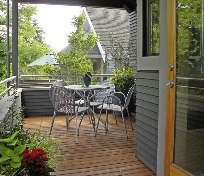 Tongue and Groove Decking Craftsman Porch with Cafe Table