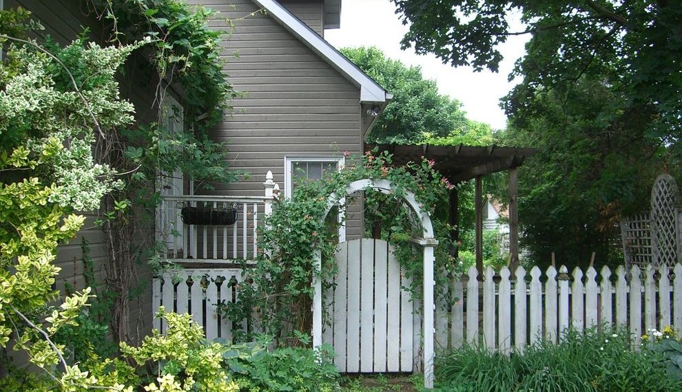 Vinyl Picket Fence Rustic Landscape with Climbing Plants
