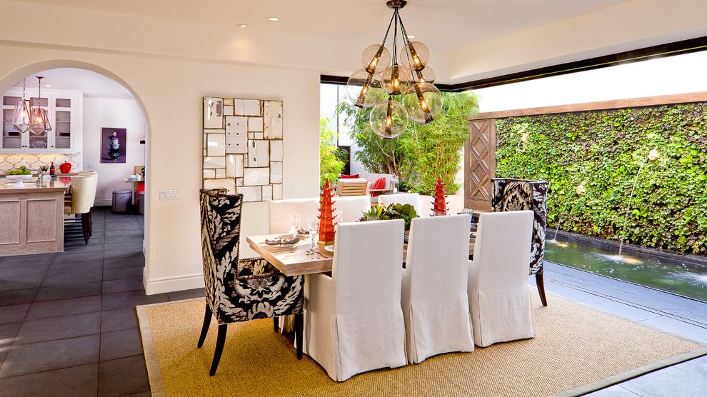 Wingback Chair Covers Mediterranean Dining Room with Eclectic Lighting